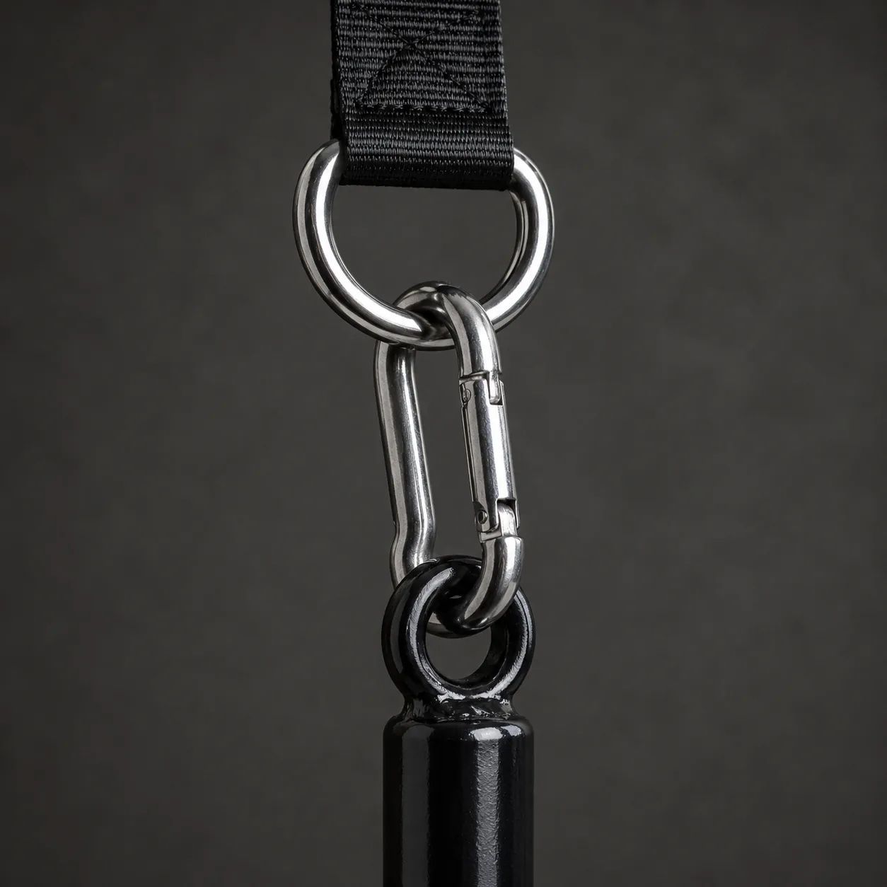Macro of the welded top ring with the steel carabiner engaged in it